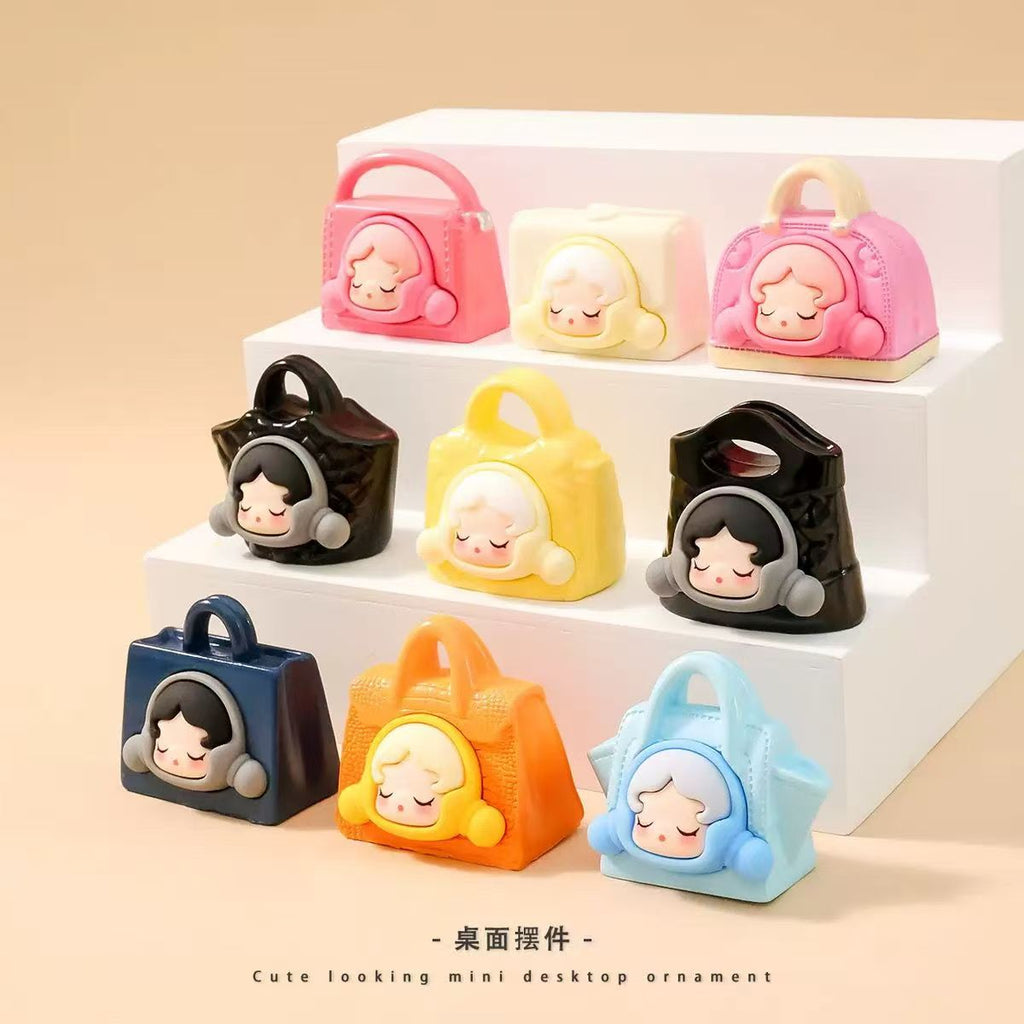 Designer handbags, cute figurines, fashionable and adorable luxury replicas, desktop decorations