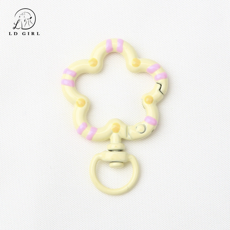 A small flower universal rotating spring buckle, flower opening ring, plum blossom spring ring, DIY jewelry accessories