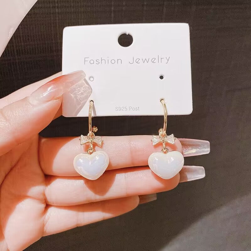 E13,925 Silver Needle Earrings D