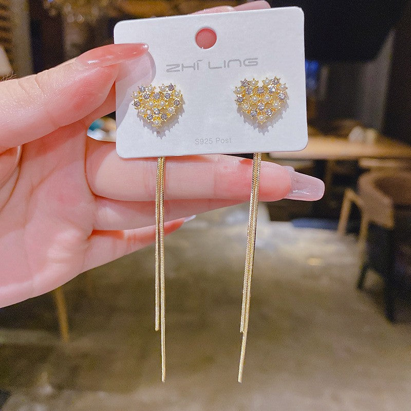 E15,925 Silver Needle Earrings  A