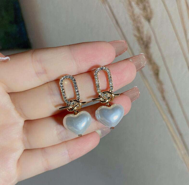 E13,925 Silver Needle Earrings D