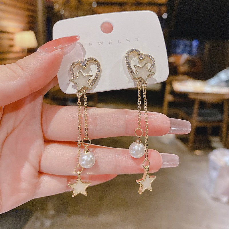 E15,925 Silver Needle Earrings  A