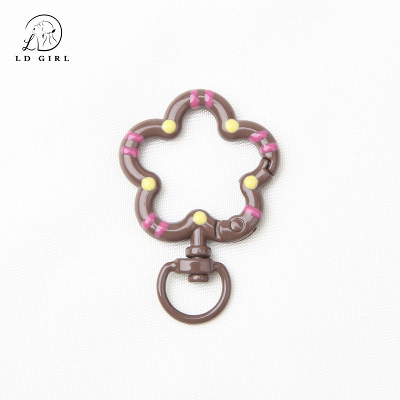 A small flower universal rotating spring buckle, flower opening ring, plum blossom spring ring, DIY jewelry accessories