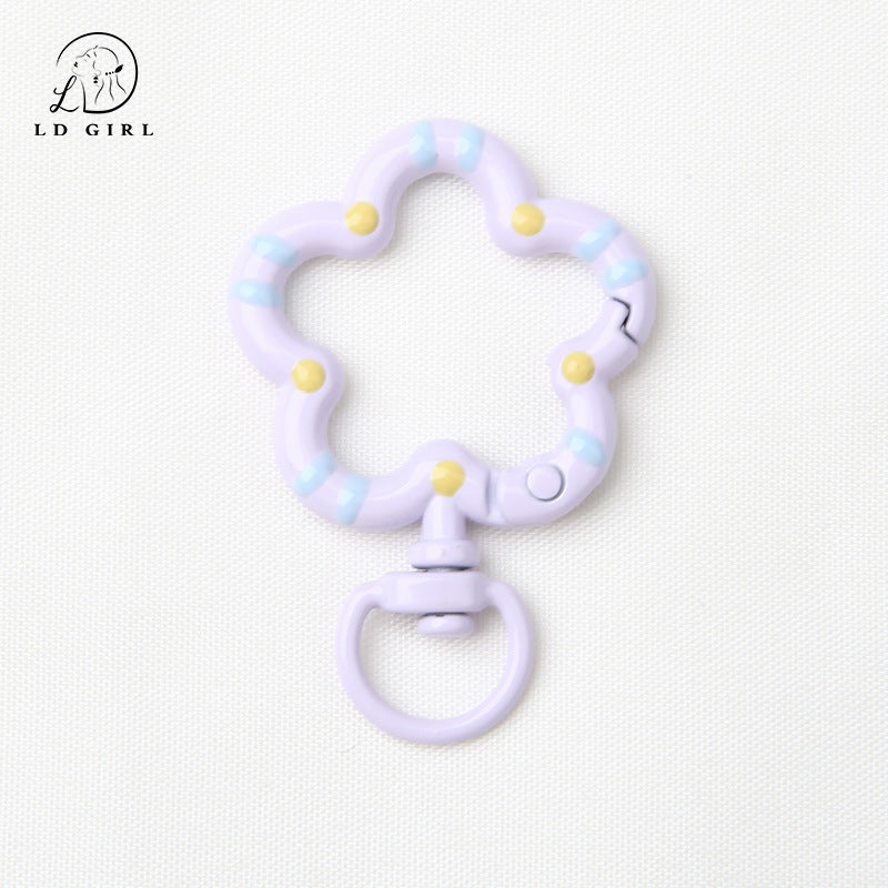 A small flower universal rotating spring buckle, flower opening ring, plum blossom spring ring, DIY jewelry accessories