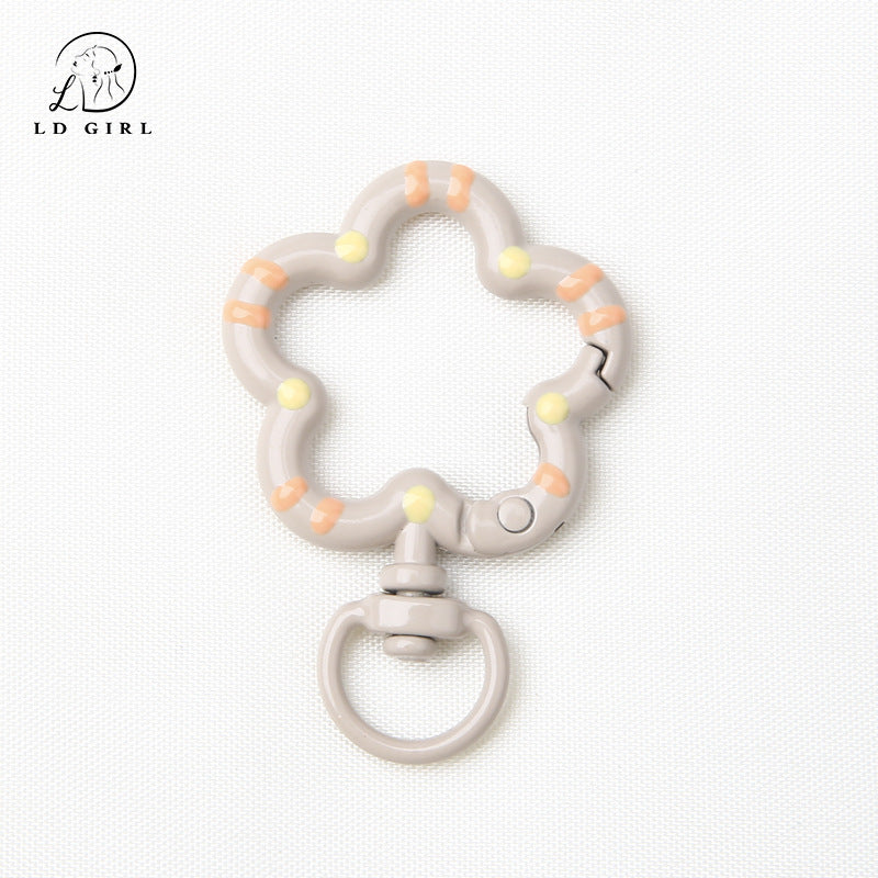 A small flower universal rotating spring buckle, flower opening ring, plum blossom spring ring, DIY jewelry accessories