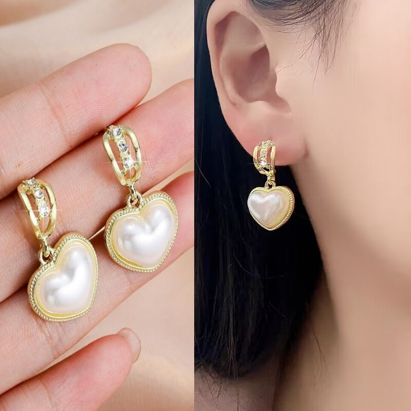 E15,925 Silver Needle Earrings  A