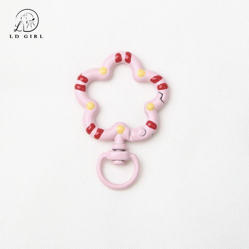 A small flower universal rotating spring buckle, flower opening ring, plum blossom spring ring, DIY jewelry accessories