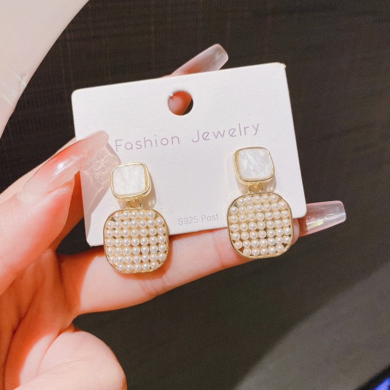 E15,925 Silver Needle Earrings  A