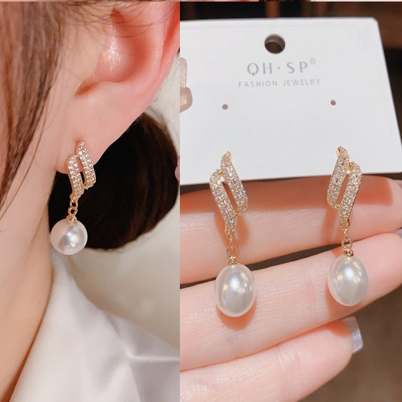 E15,925 Silver Needle Earrings  A