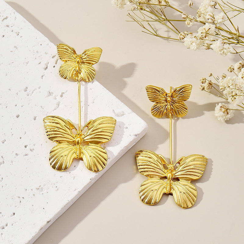 Gold flower earrings, fashionable commuting, versatile, stud earrings, light luxury earrings.