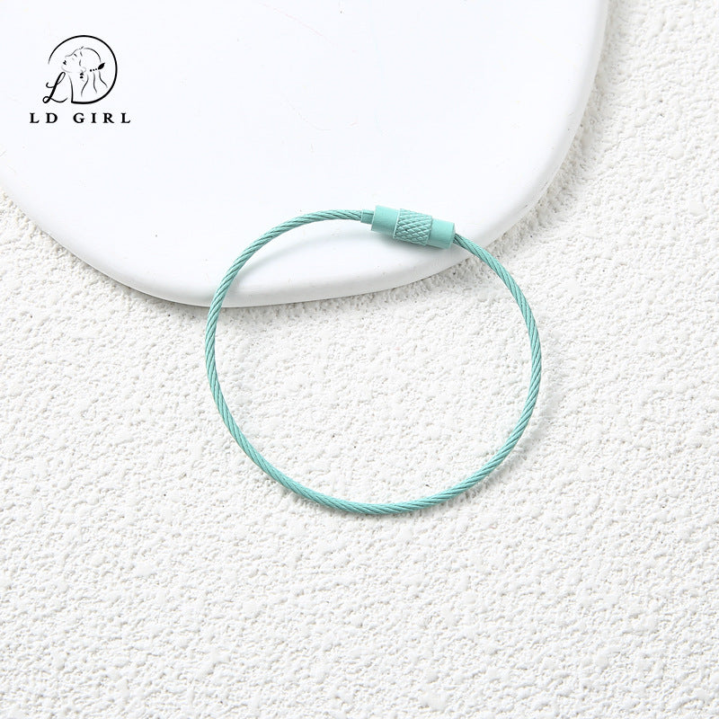 A candy colored wire rope ring