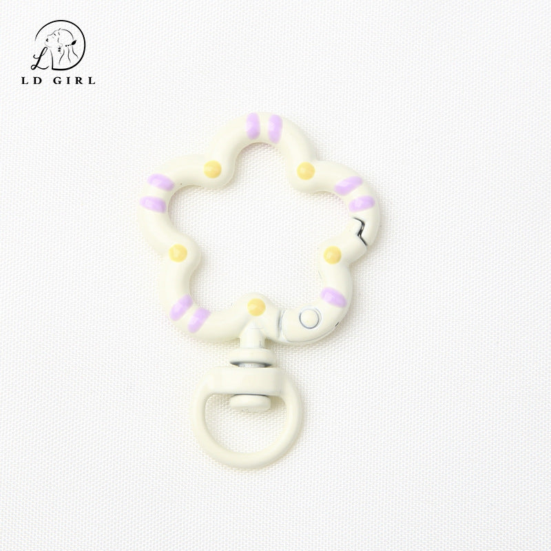 A small flower universal rotating spring buckle, flower opening ring, plum blossom spring ring, DIY jewelry accessories