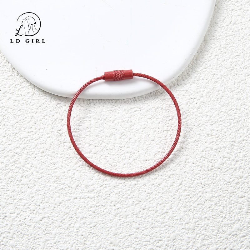 A candy colored wire rope ring