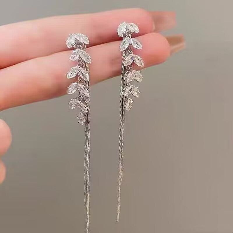 E15,925 Silver Needle Earrings  A