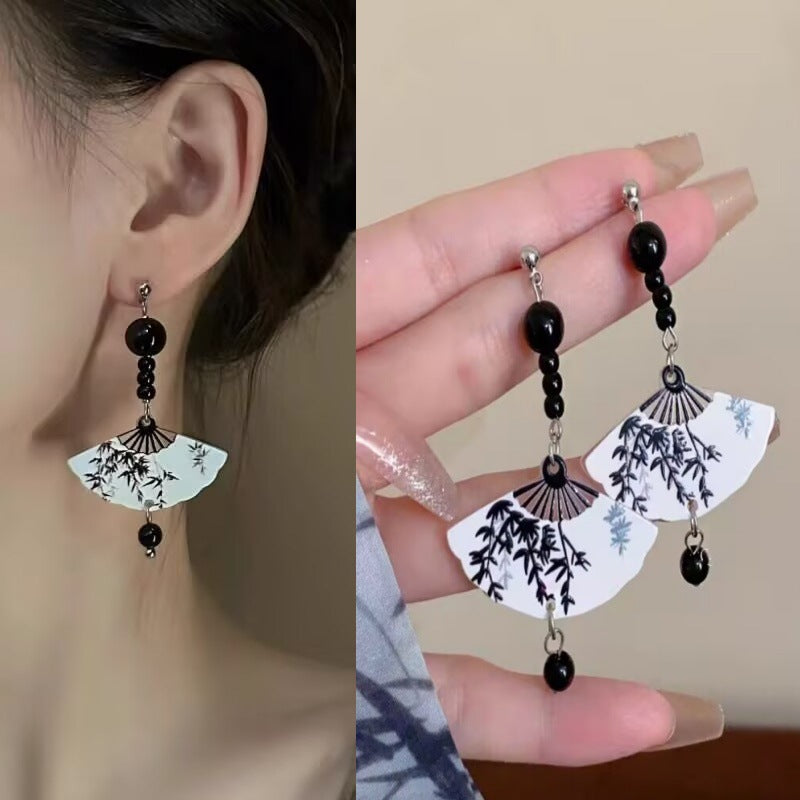 E15,925 Silver Needle Earrings  A