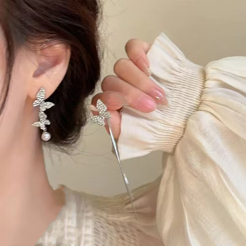 E13,925 Silver Needle Earrings D