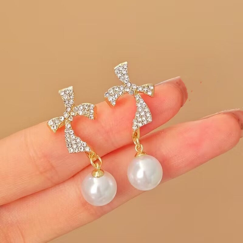 E13,925 Silver Needle Earrings D