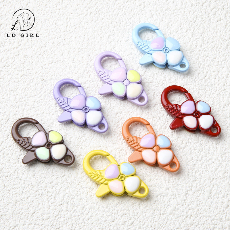 A Four-leaf clover spring buckle, hanging buckle, jewelry accessories, mobile phone chain, keychain