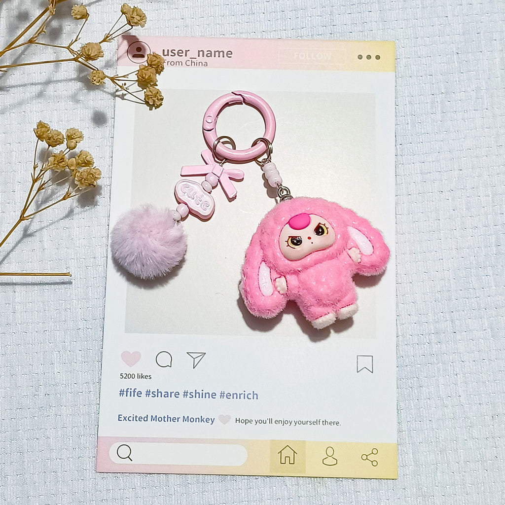 Bow flocked big-eared doll, cartoon keychain three-dimensional doll