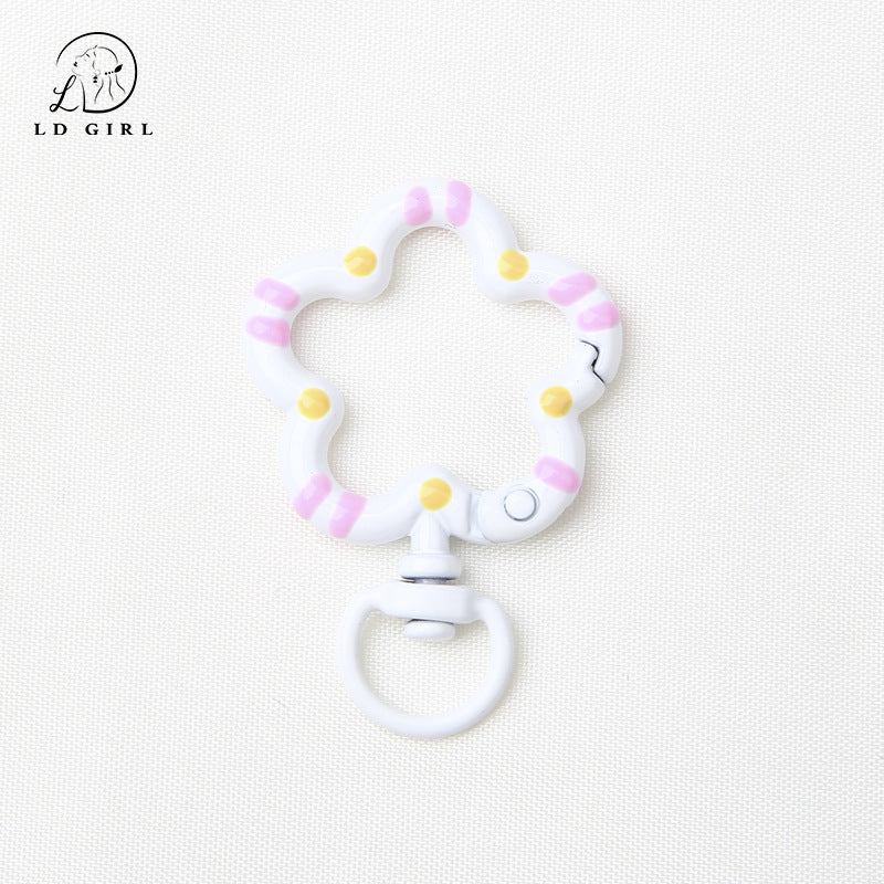 A small flower universal rotating spring buckle, flower opening ring, plum blossom spring ring, DIY jewelry accessories