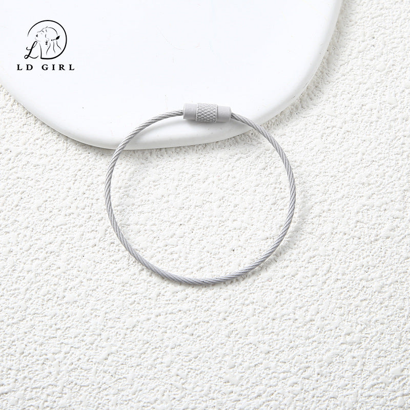 A candy colored wire rope ring