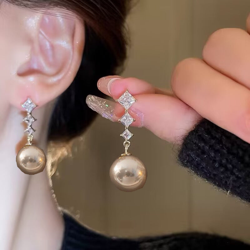 E14,925 Silver Needle Earrings B