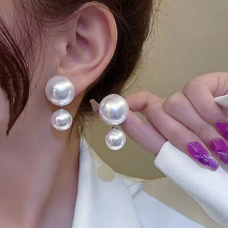 E15,925 Silver Needle Earrings  A