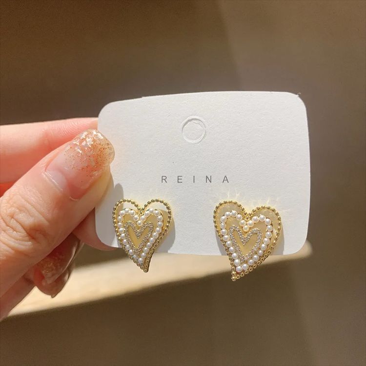 E15,925 Silver Needle Earrings  A