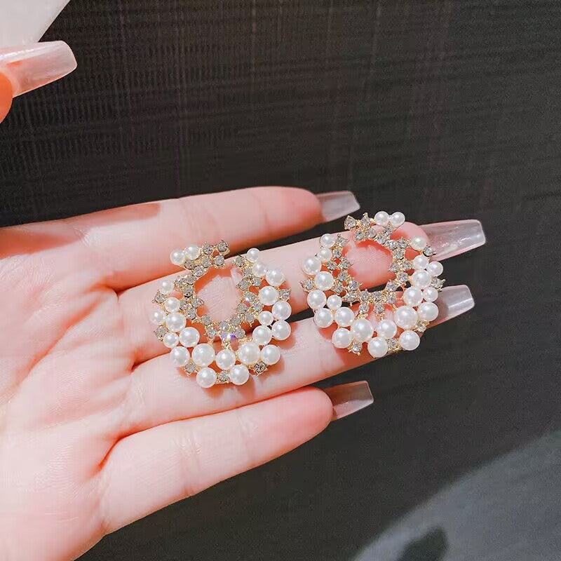 E15,925 Silver Needle Earrings  A