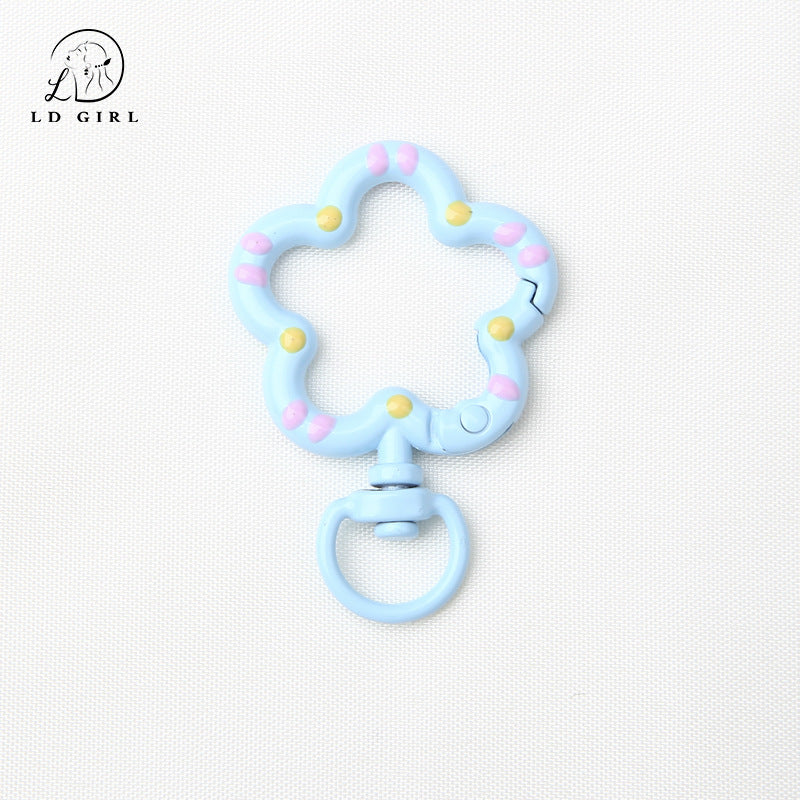 A small flower universal rotating spring buckle, flower opening ring, plum blossom spring ring, DIY jewelry accessories