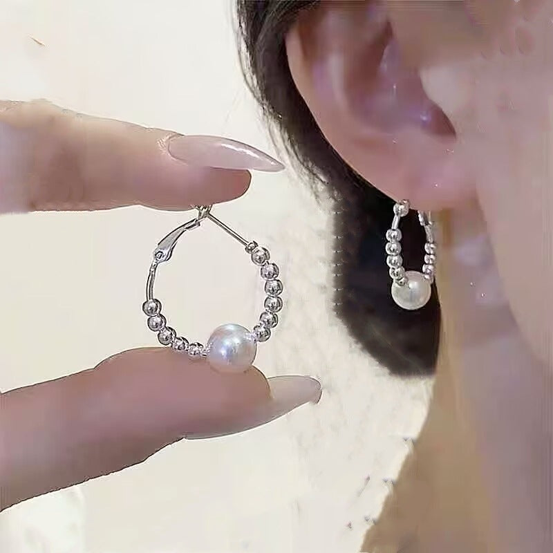 E14,925 Silver Needle Earrings B