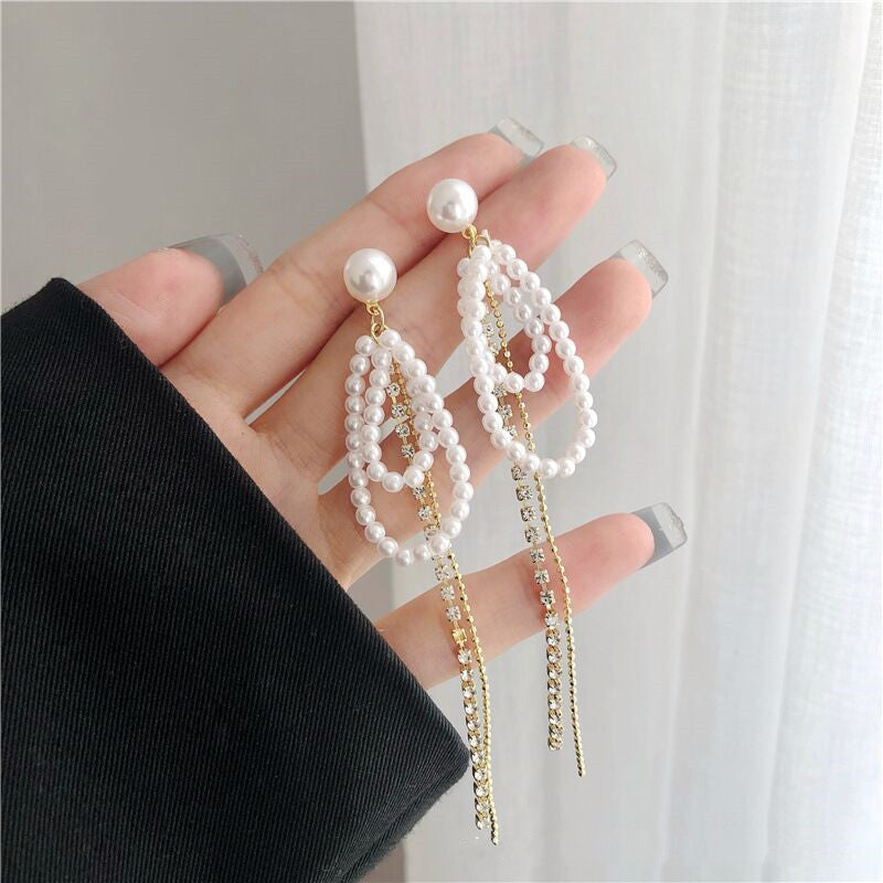 E15,925 Silver Needle Earrings  A