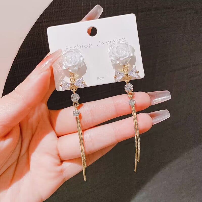 E15,925 Silver Needle Earrings  A