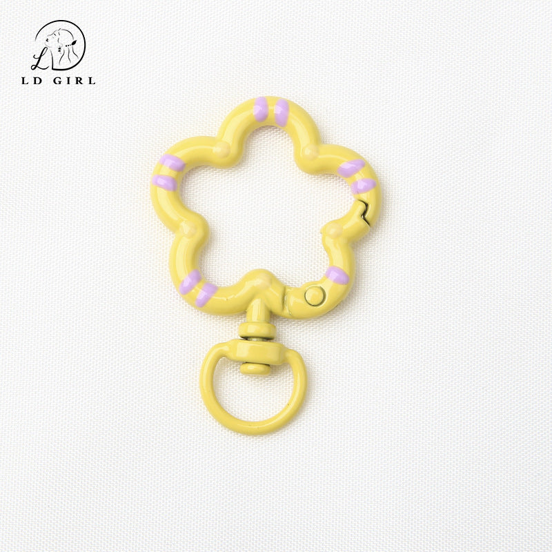 A small flower universal rotating spring buckle, flower opening ring, plum blossom spring ring, DIY jewelry accessories