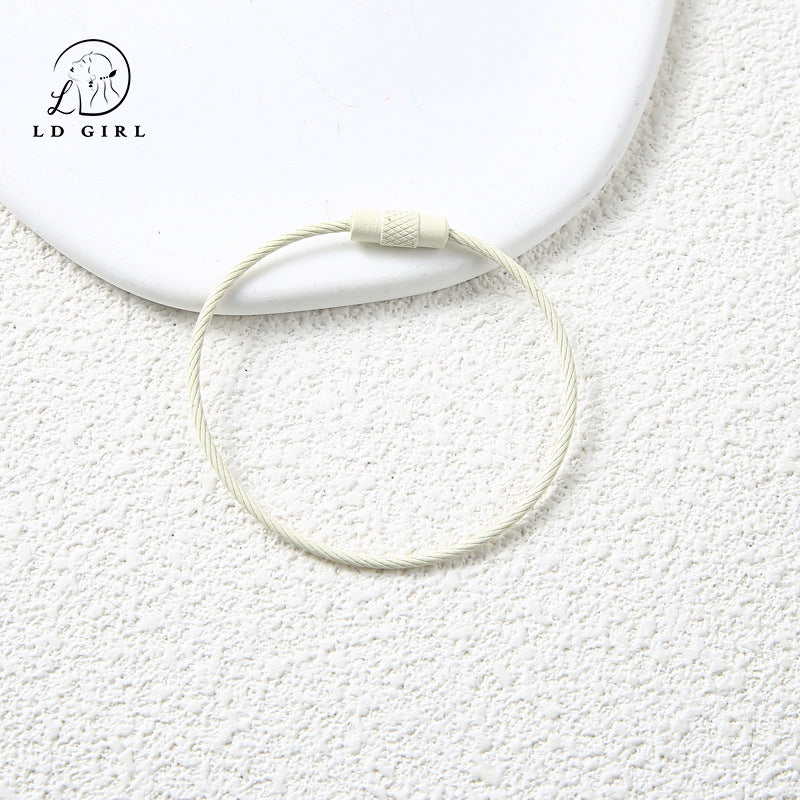 A candy colored wire rope ring