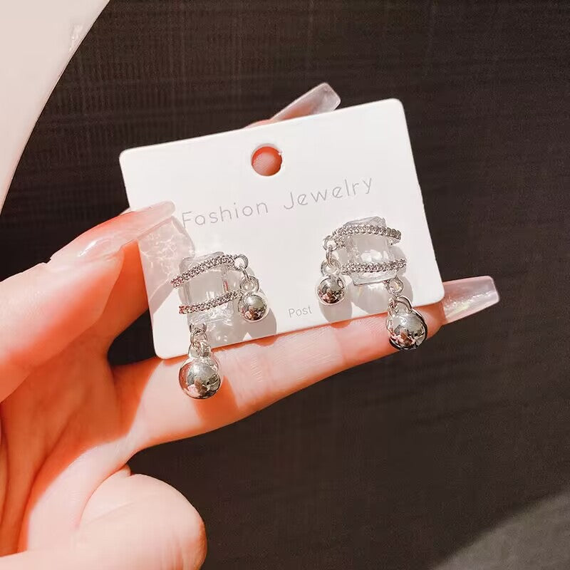 E15,925 Silver Needle Earrings  A