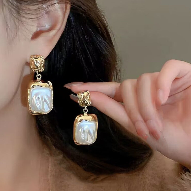 E14,925 Silver Needle Earrings B