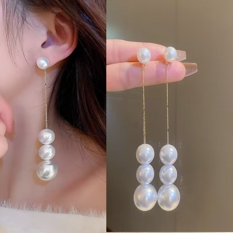 E15,925 Silver Needle Earrings  A