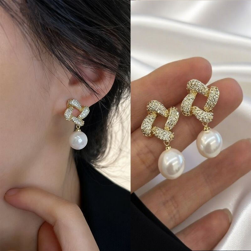 E15,925 Silver Needle Earrings  A