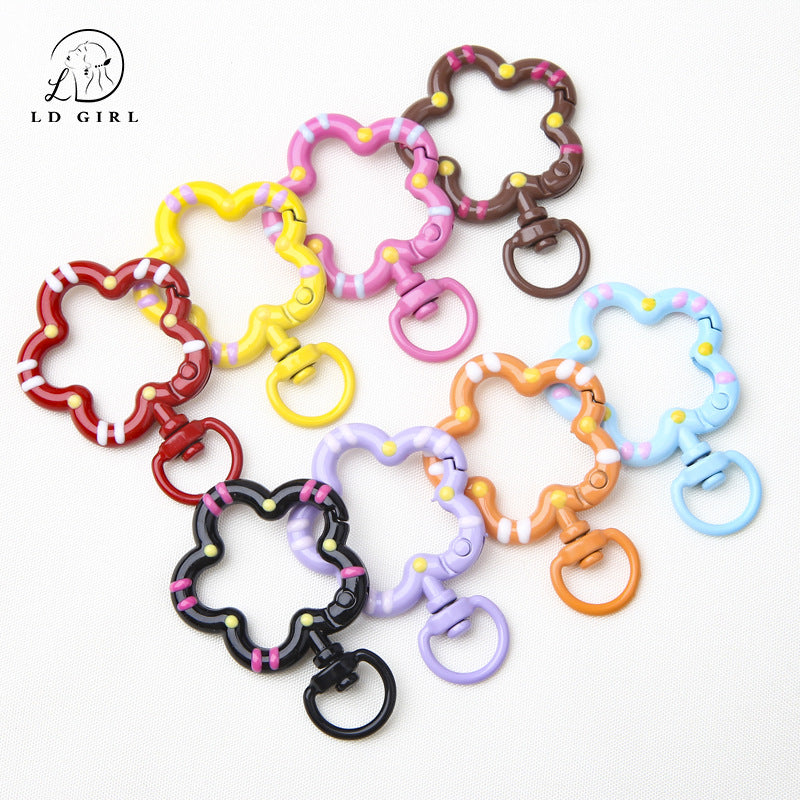 A small flower universal rotating spring buckle, flower opening ring, plum blossom spring ring, DIY jewelry accessories