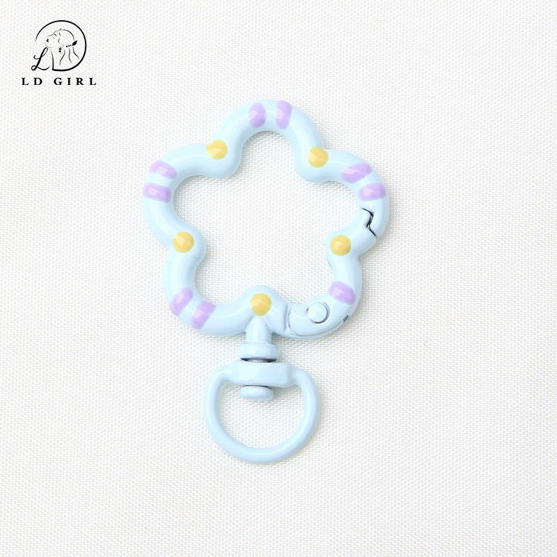 A small flower universal rotating spring buckle, flower opening ring, plum blossom spring ring, DIY jewelry accessories