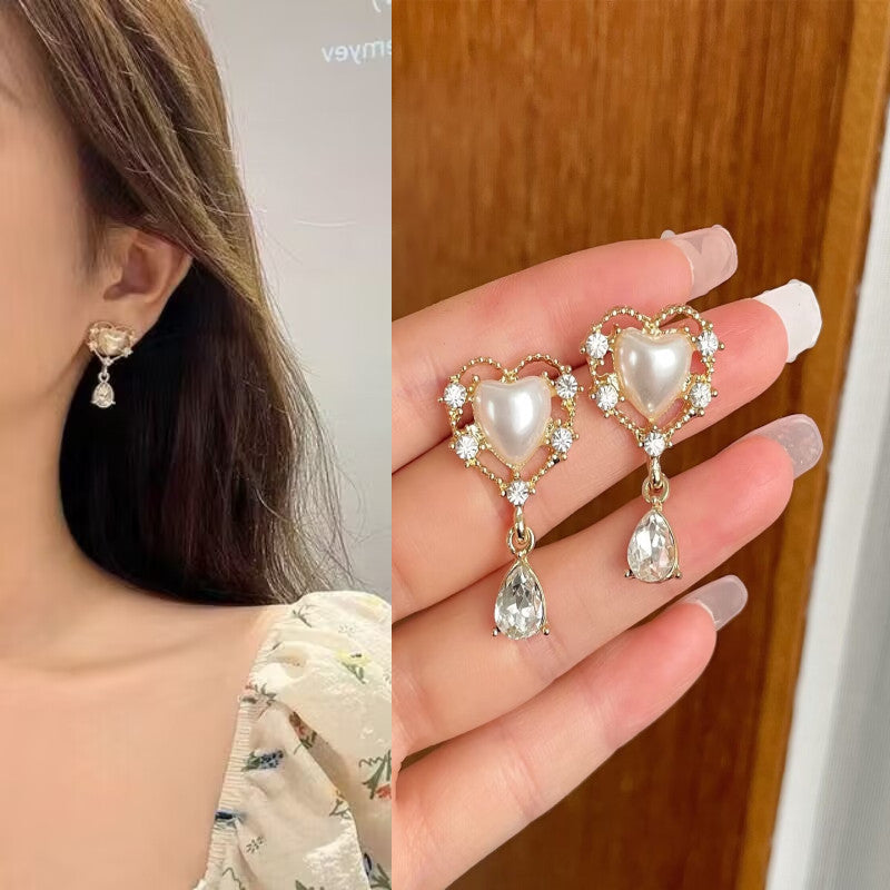 E14,925 Silver Needle Earrings B