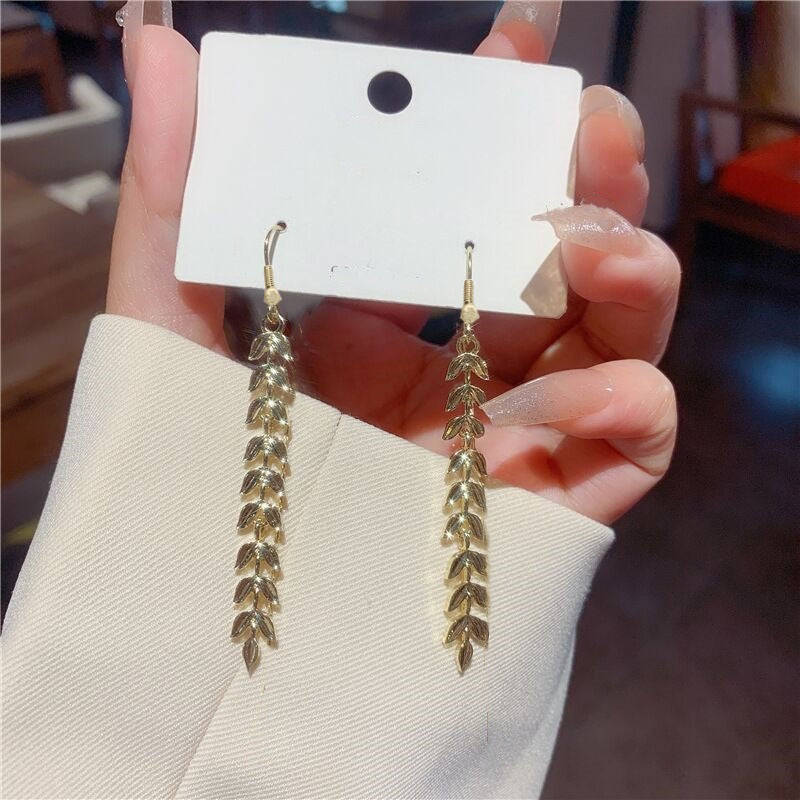E15,925 Silver Needle Earrings  A