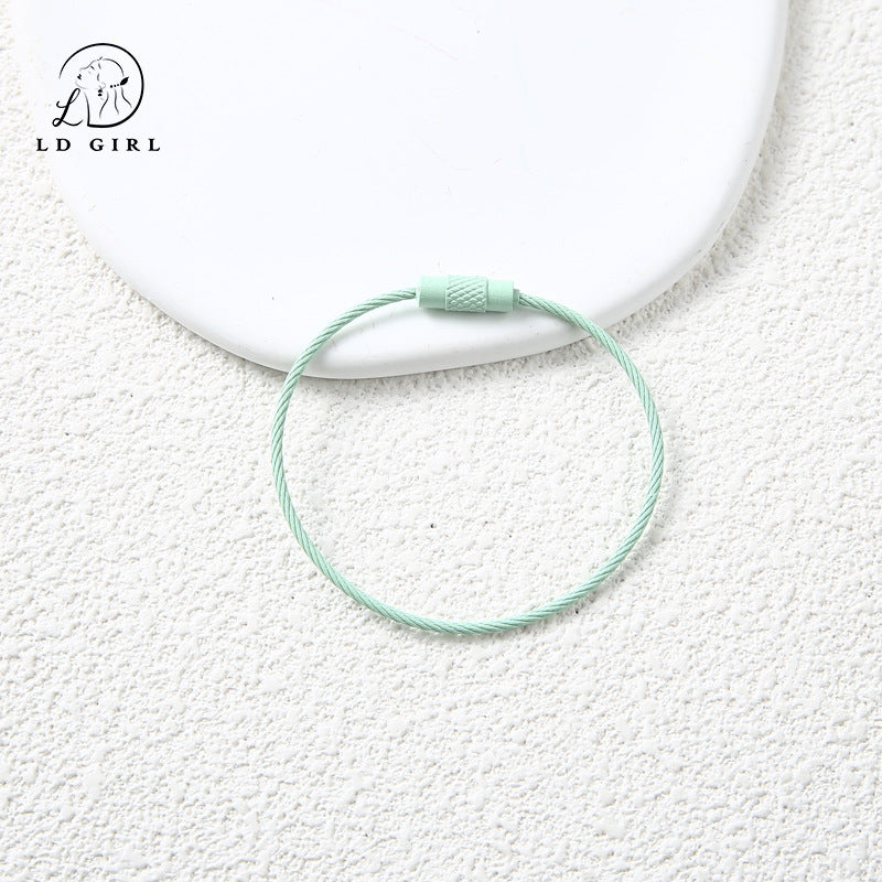 A candy colored wire rope ring