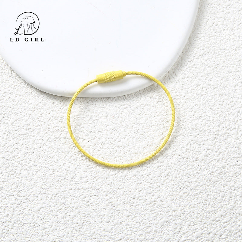 A candy colored wire rope ring