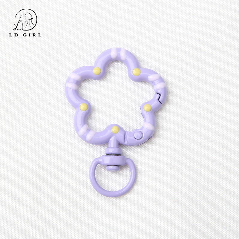 A small flower universal rotating spring buckle, flower opening ring, plum blossom spring ring, DIY jewelry accessories