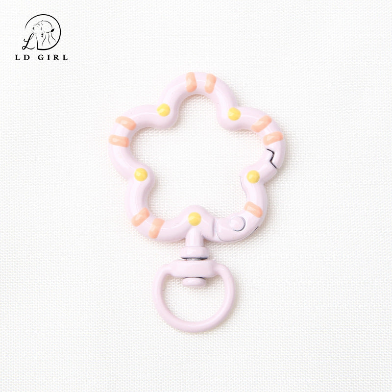 A small flower universal rotating spring buckle, flower opening ring, plum blossom spring ring, DIY jewelry accessories