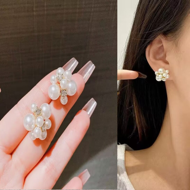 E15,925 Silver Needle Earrings  A