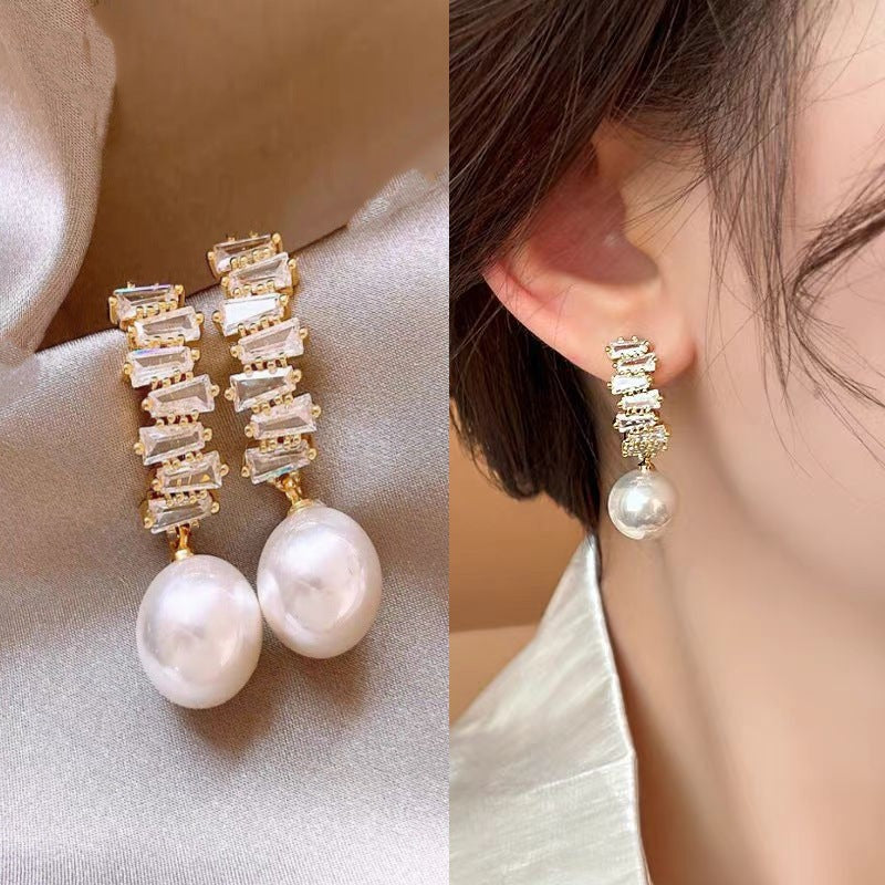 E15,925 Silver Needle Earrings  A