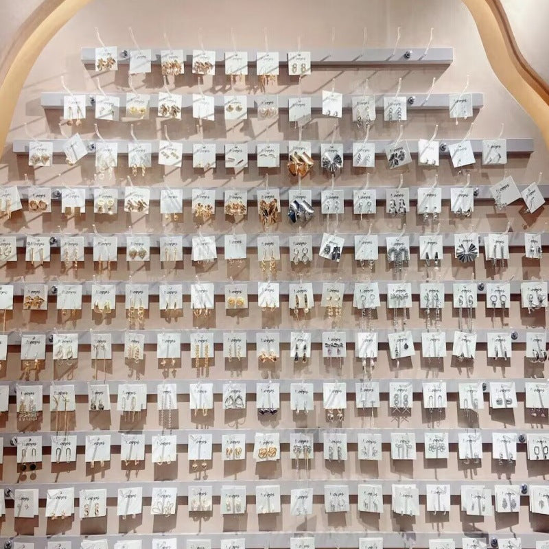 E14,925 Silver Needle Earrings B